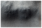 Выступ в слоистых отложениях Южного полюса Марса
