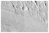 Извилистый хребет, тянущийся через геологические элементы формации борозды Медузы