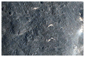 Молодой кратер с возможным содержанием пироксенов