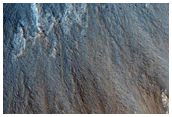 Northern Plains Impact Crater Exposing Bright Subsurface Material
