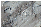 Piccoli coni craterizzati e strani flussi di lava a sud di Ascaeus Mons