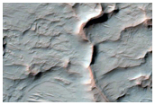 Sinuous Ridge with Mesa at Terminus in Kasabi Crater