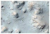 Longitudinally Aligned Mounds in Hanging Channel Within Mangala Valles