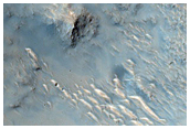 Streamlined Shapes in Flat Floored Valley in Western Libya Montes