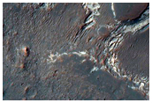 Light-Toned Layered Material in MOC E14-01710