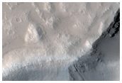 Crater Cut by Graben in Tantalus Fossae
