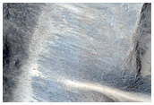 Bright Striated Crater Walls