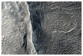 Fractures in Old Crater Deposit in Northern Mid-Latitudes
