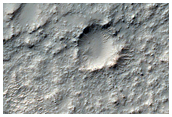 Crater with Inlet and Outlet Channels in Noachis Terra