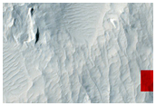 Layered Materials and Blocks in Olympus Mons Aureole
