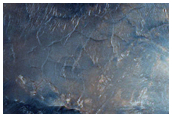 Channel and Depression in Northeast Syrtis Major Planum