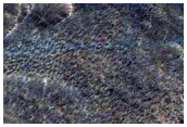Change Detection in Chain of Small Pits North of Alba Patera