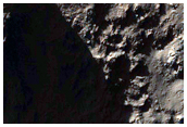 Light-Toned Patches on Mountain in CTX Image 