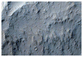 Ejecta Blanket and Superposed Crater