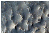 أخدود ضيق وتل طويل قرب وادى هراد (Hrad Vallis)