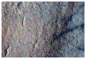 تصدعات فى أرضية  فوهة في سهول « يوتوبيا»  (Utopia Planitia)