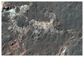 Light-Toned Layered Deposits along Ladon Valles Basin Floor