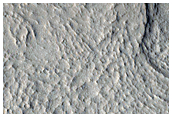 Banded Landforms on Crater Floor Near Acheron Fossae