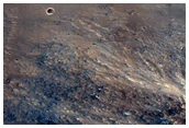 Bouldery Landslide in Channel between Aurorae and Hydraotes Chaos