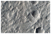 Light-Toned Layered Material in Northwest Schiaparelli Crater
