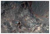 Contact between Clays and Dark Deposits along Coprates Region Plateau