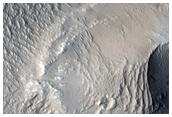 Valleys Cut across Northern Lycus Sulci
