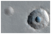 Terraced Crater on Larger Crater Ejecta in CTX Image