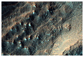 Tongue-Shaped Feature on Crater Wall in Southern Mid-Latitudes