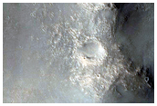 Crater East of Licus Vallis
