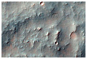Arcuate Banded Terrain and Other Surfaces in Terra Sirenum