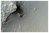 Layers in Depression on Floor of South Mid-Latitude Crater