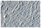 Layers in Mound on Crater Floor at Northeast End of Marte Vallis System