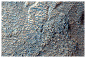 Flow and Banded Terrain on Hellas Planitia Floor