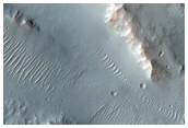 Fans and Olivine-Rich Bedrock in Kontum Crater
