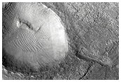 Complex of Anastomosing Valleys on Northeast Hellas Planitia Rim