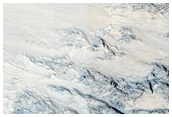 Massifs and Layers in a Sirenum Fossae Trough