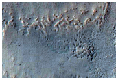 Овраги на двух разных уровнях в кратере внутри кратера Copernicus