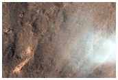 Transition from Continuous to Discontinuous Ejecta of Gratteri Crater