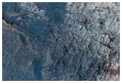 Light-Toned Hydrated Materials Inside Ius Chasma
