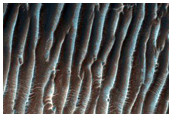 Light-Toned Deposits along Northern Ius Chasma Floor