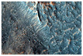 Fractured Floor Materials in Crater in Arabia Terra