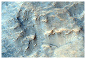 Contacts between Isidis Planitia Olivine-Rich Units and Other Units