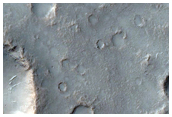 Possible Preserved Impact Melt Flow on Ejecta of Bakhuysen Crater