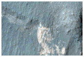 Contact between Light-Toned Deposits and Wallrock in Northern Melas Chasma