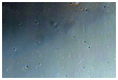 Small Crater in Herschel Crater with Recurring Slope Lineae-Like Features
