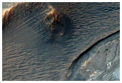 Light-Toned Materials Exposed within Noctis Labyrinthus Hills