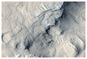 Very Large Inflation Features in Eastern Amazonis Planitia