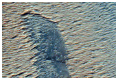 Light-Toned Materials Exposed within Noctis Labyrinthus Hills