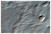 Channels and Fluidized Material Northeast of Hale Crater