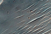 Mounds and Small Ridges along Wrinkle Ridge on Huygens Crater Floor